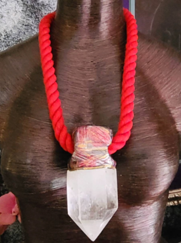 Clear Quartz Point Sculpted Tower Pendant with a Burnished Red Rope