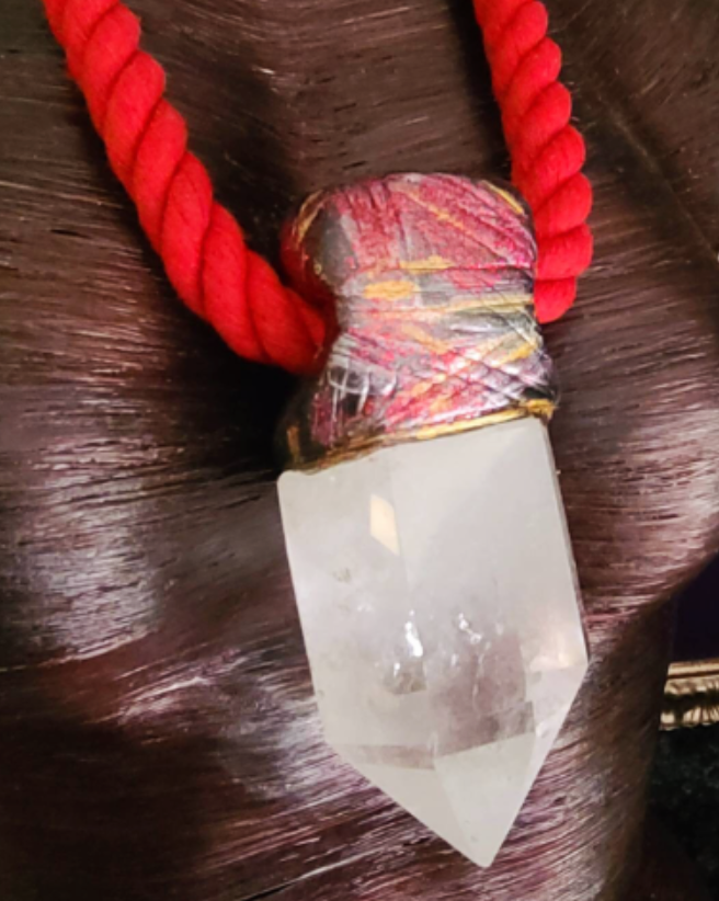 Clear Quartz Point Sculpted Tower Pendant with a Burnished Red Rope