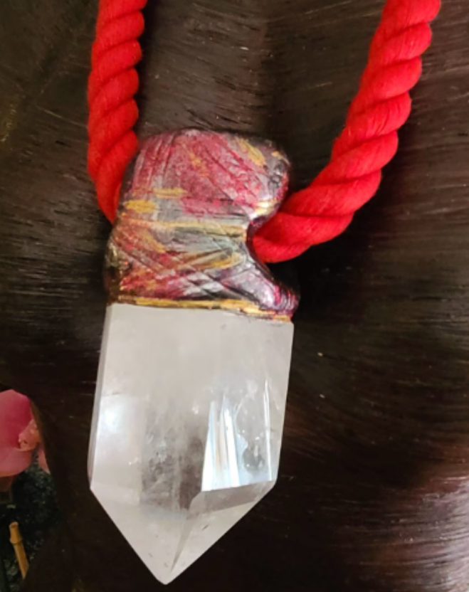 Clear Quartz Point Sculpted Tower Pendant with a Burnished Red Rope