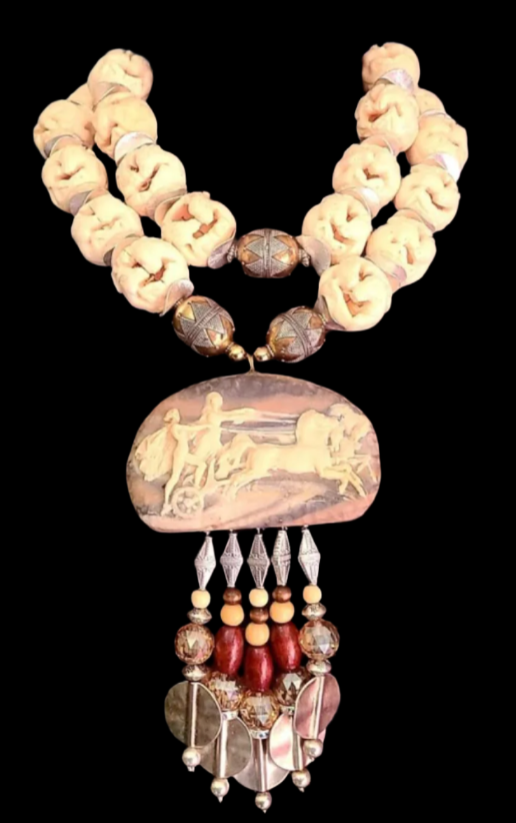 Incolay Stallion Beaded Pendant with a Carved Goat Motif Bone Necklace