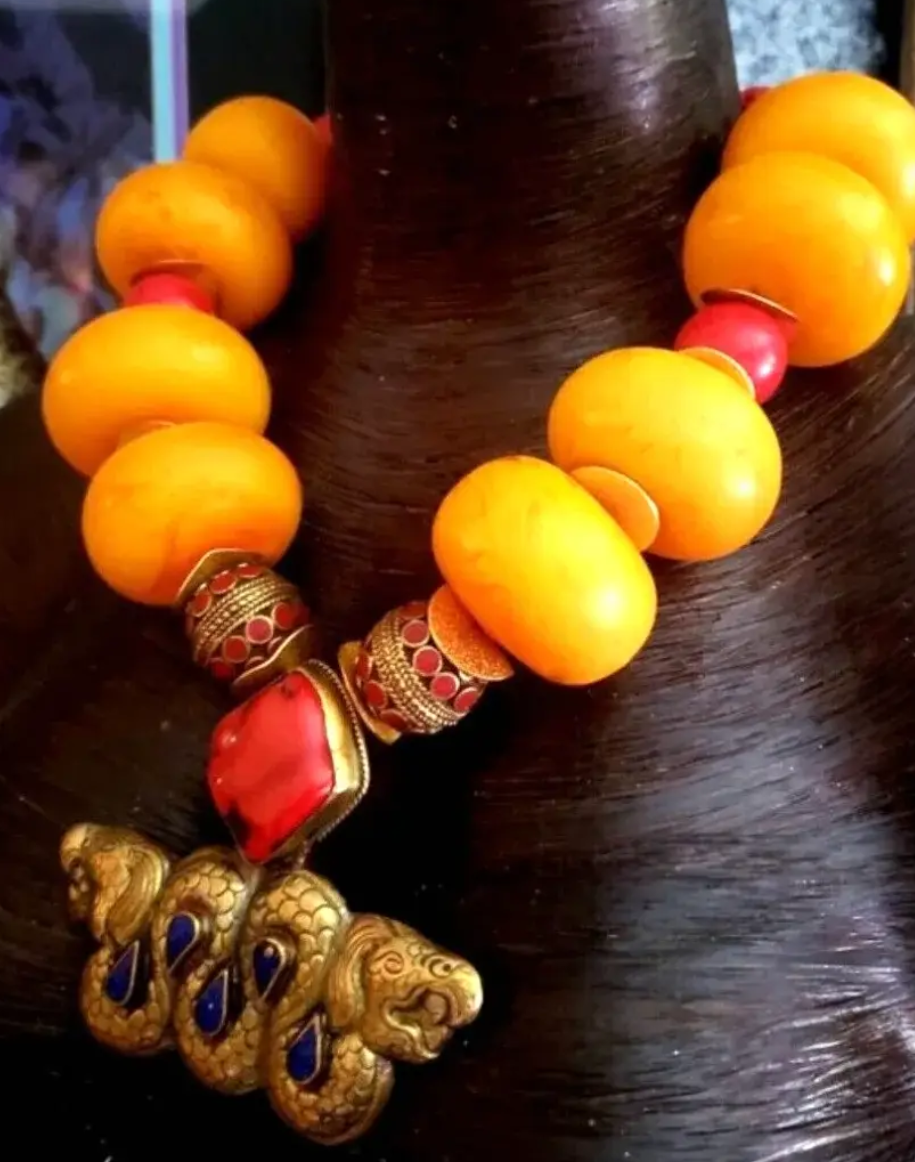 Oversized Moroccan Resin Beaded Ethnic Necklace with Tibetan Dragon Pendant, Luxury Tribal Faux Amber Neck Candy, Untamed Nomadic Beaded Neck Piece from Kat Kouture