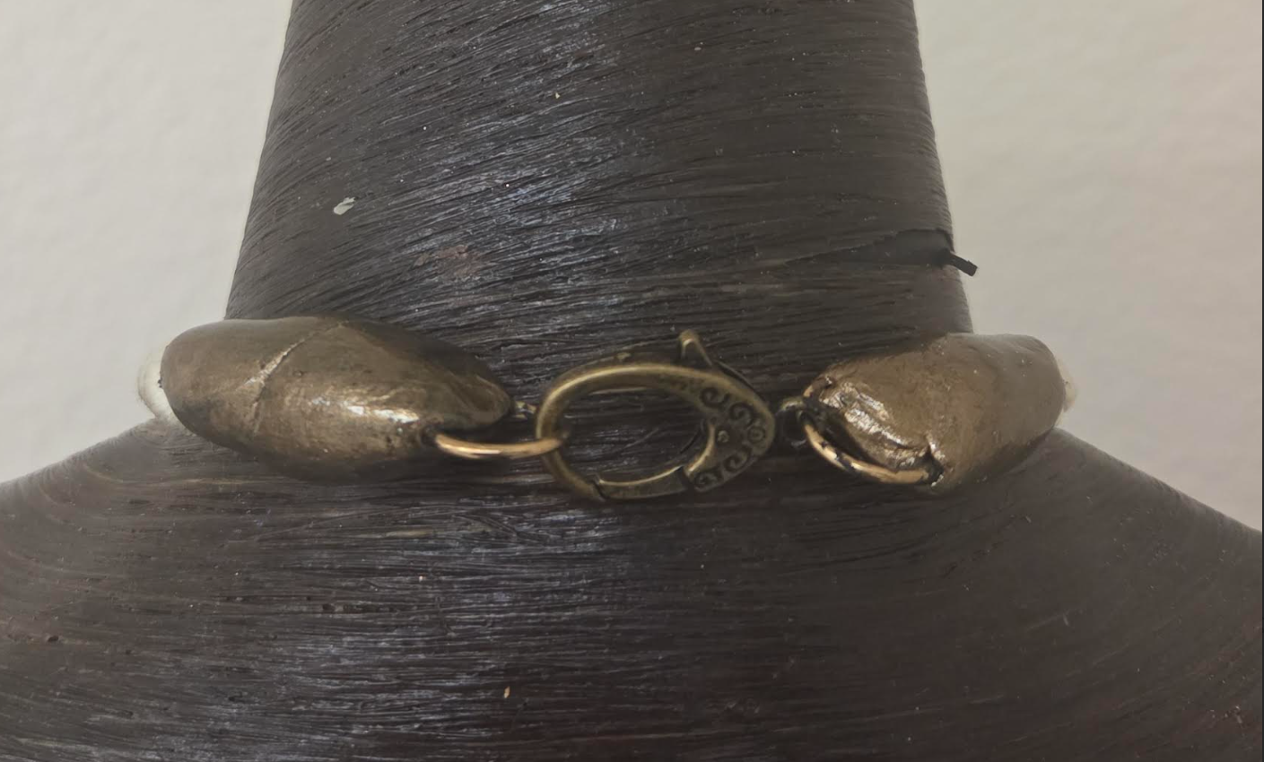 Sculpted Gemmy Smoky Quartz Pendant on an Ivory Satin Rope